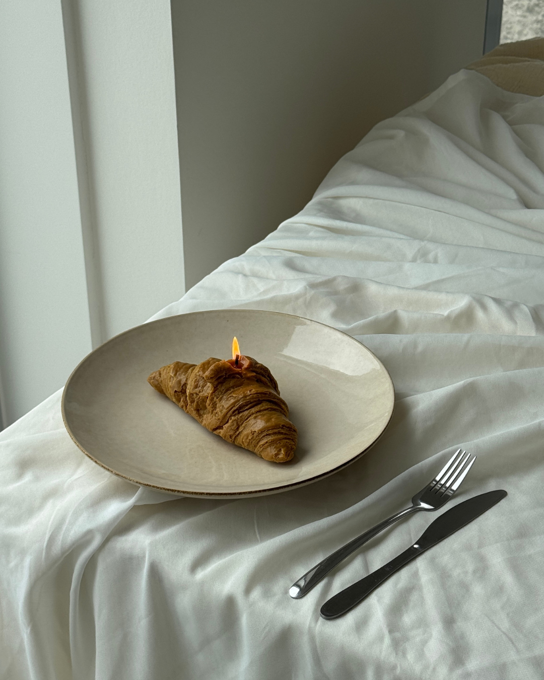 Bougie parfumée croissant au beurre.