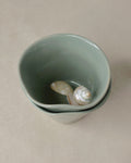 Tasse tulipe turquoise pâle.